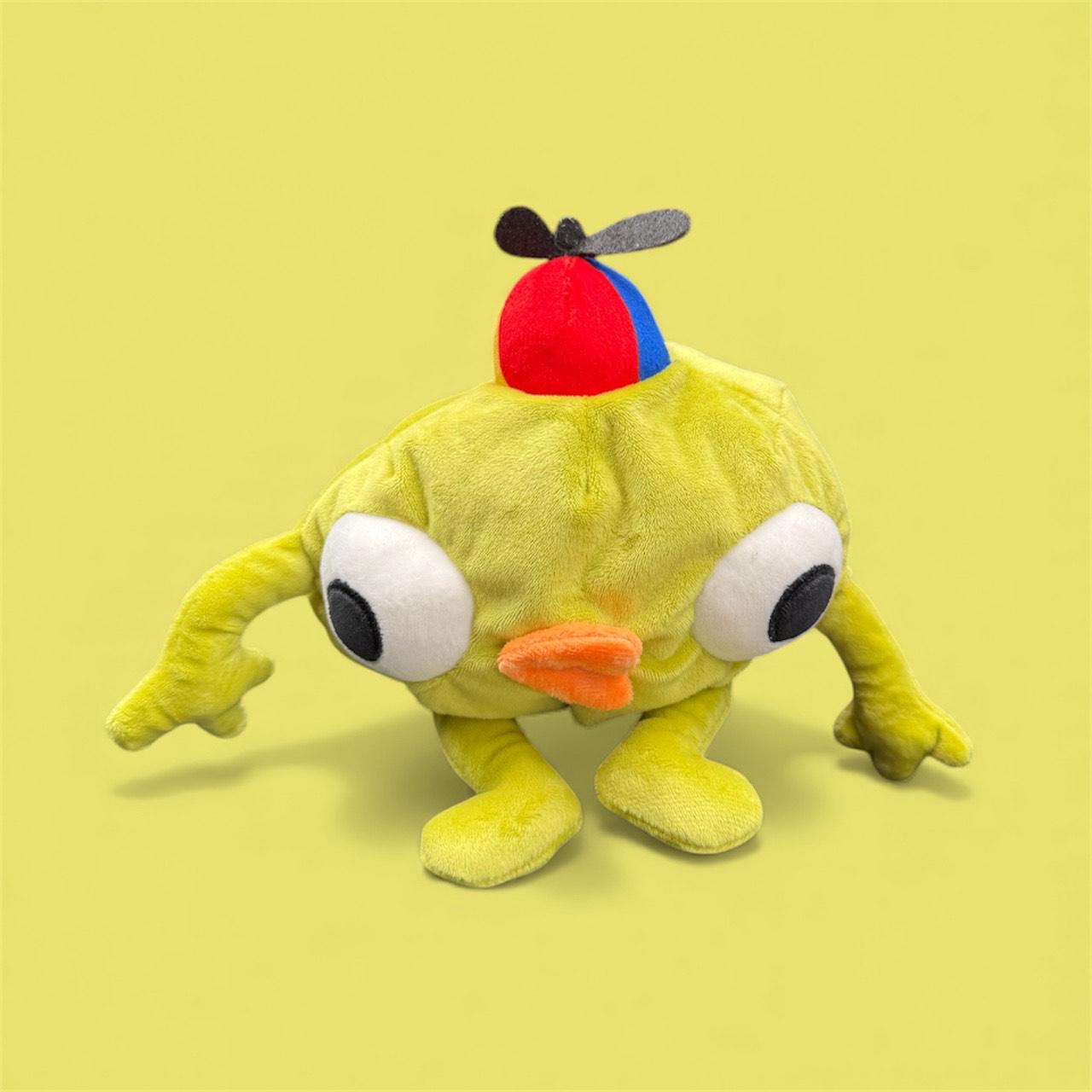 Handmade Bing Bong plush chalk bag for bouldering on green background 