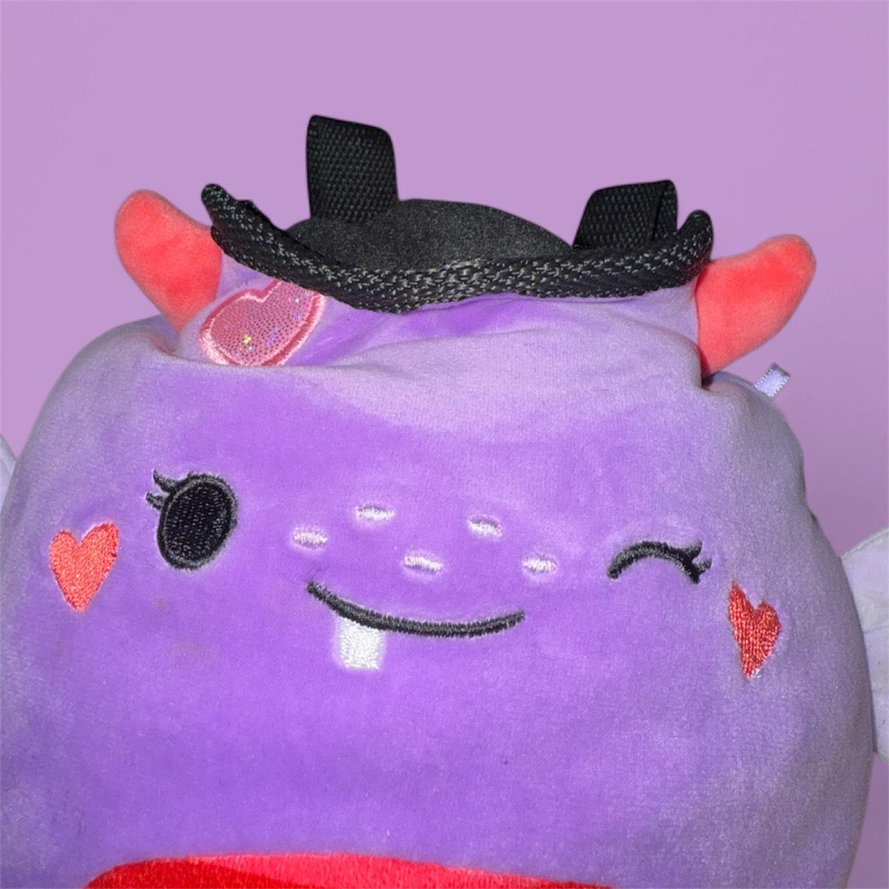 Purple Chalk bag handmade converted plush toy with devil horns, wings, and a red tail on a purple background squishmallow close up 