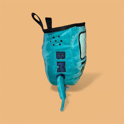 Handmade BMO plush chalk bag for bouldering on orange background side profile