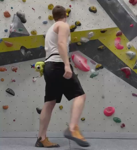 powder pals bing bong chalk bag in climbing gym 